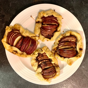 Four completed apple galettes